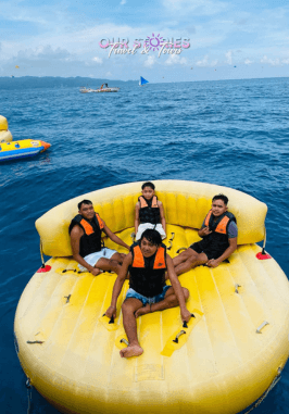 Boracay banana boat ride with tourists enjoying fun water activity in Boracay Philippines