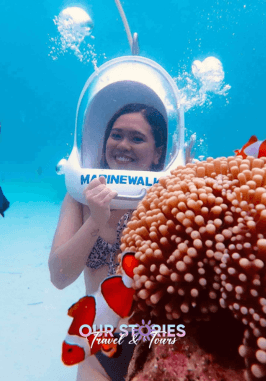 Boracay helmet diving marine walk with tourist underwater exploring coral reef in Boracay Philippines