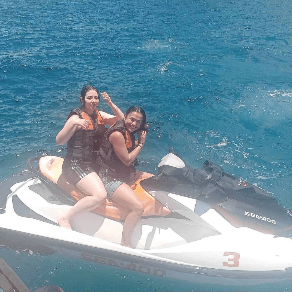 Boracay jet ski ride with tourists enjoying water adventure in Boracay Philippines