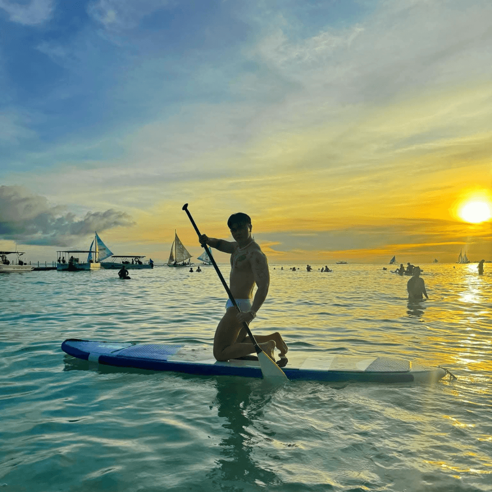 Boracay paddle boarding sunset beach activity Philippines
