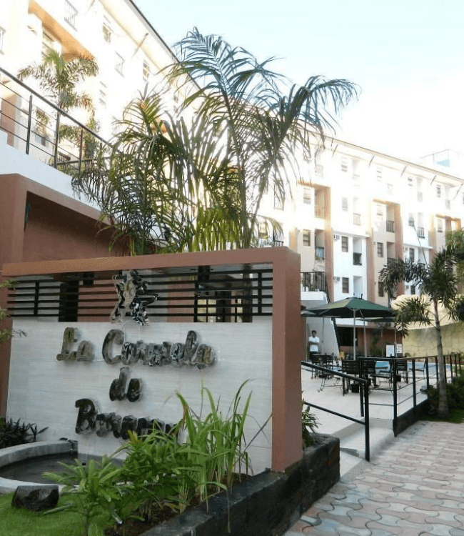 Boracay resort entrance surrounded by tropical landscaping.