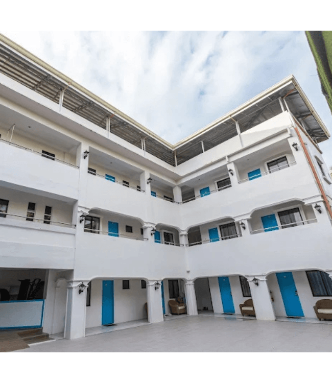 Boracay resort building with bright white architecture and blue accents.
